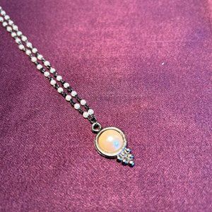 Vintage 16” silvertone and white beaded pendant necklace